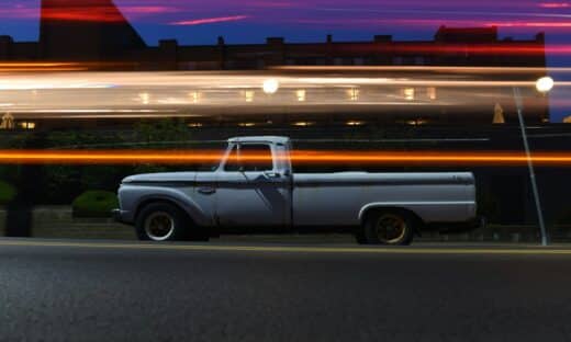 timelapse photo of white single cab truck