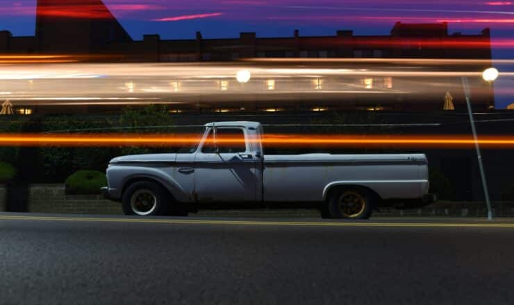 timelapse photo of white single cab truck